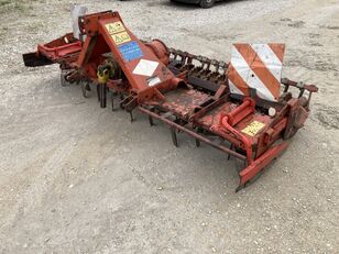 Kuhn HRB 302 D + Güttler Packer grada rotativa